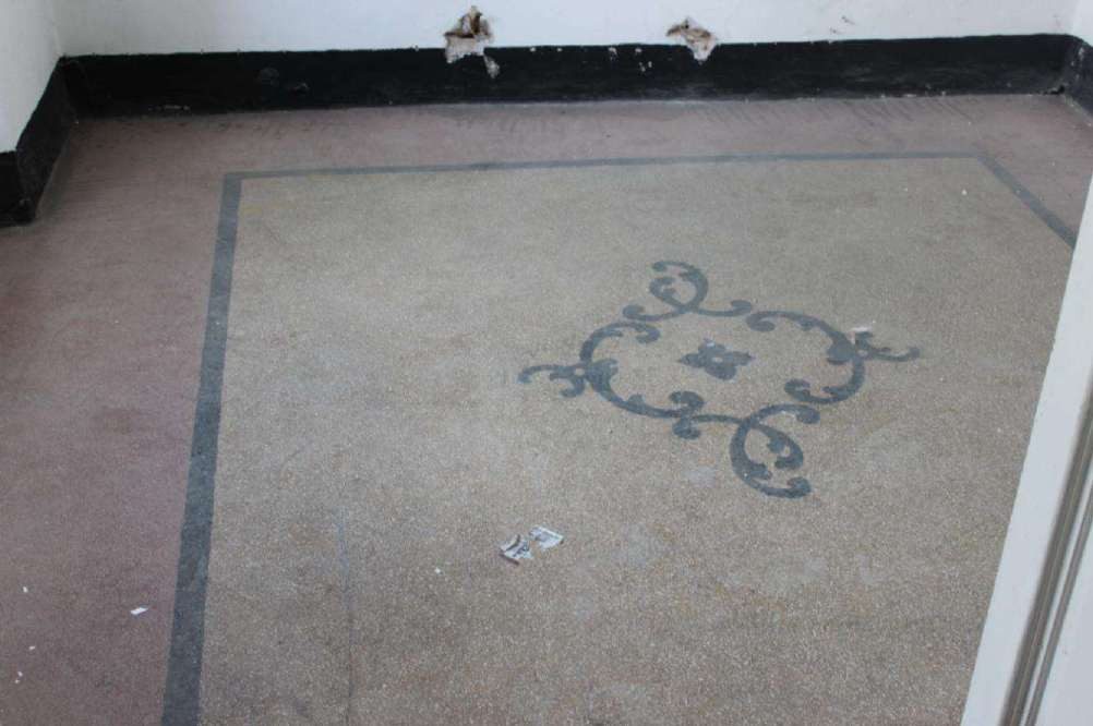 Terrazzo floor with a central decorative motif